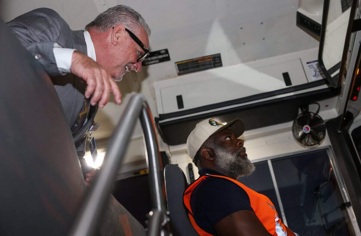 Fort Worth Independent School District Superintendent Peter Licata, left, talks to bus driver Kenneth Meeks during the first day of school on Monday, Aug. 10, 2026, in Fort Worth.